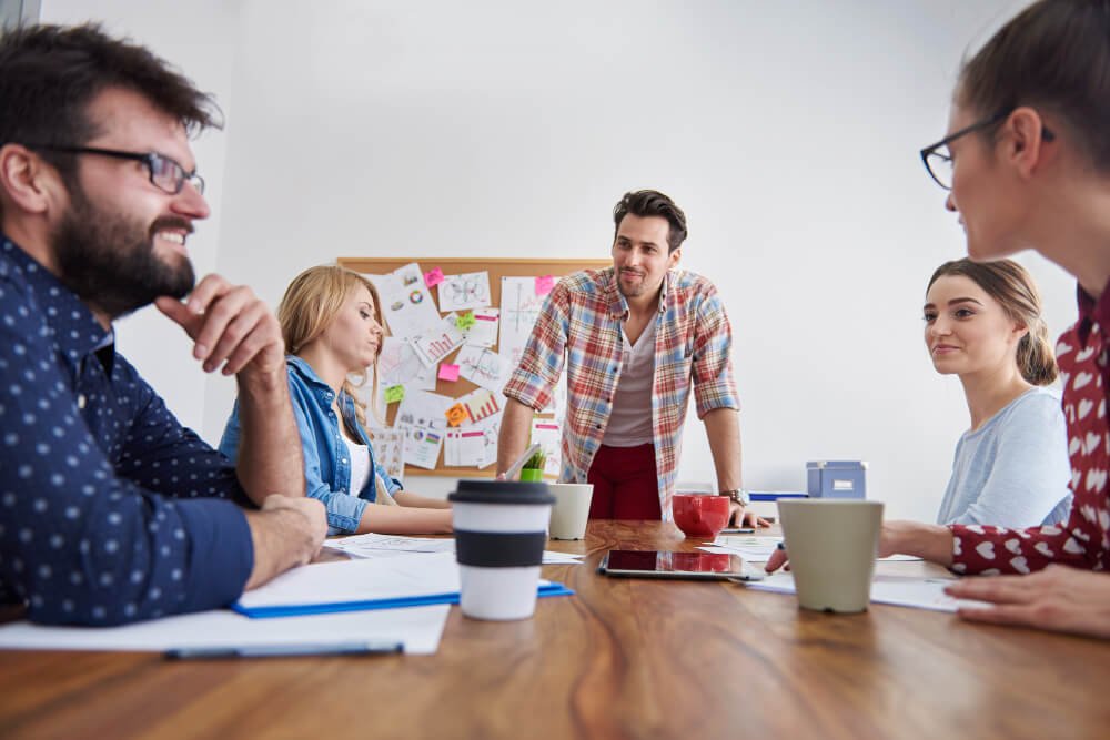 Business team collaborating on budgeting and financial planning in a modern office