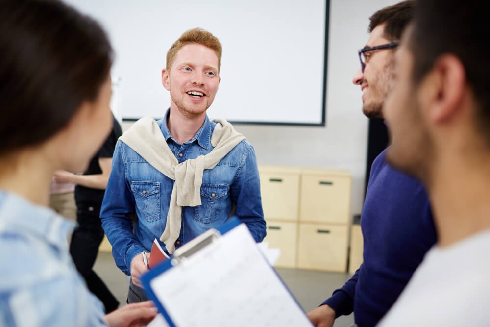 Young professionals collaborating during a financial planning workshop