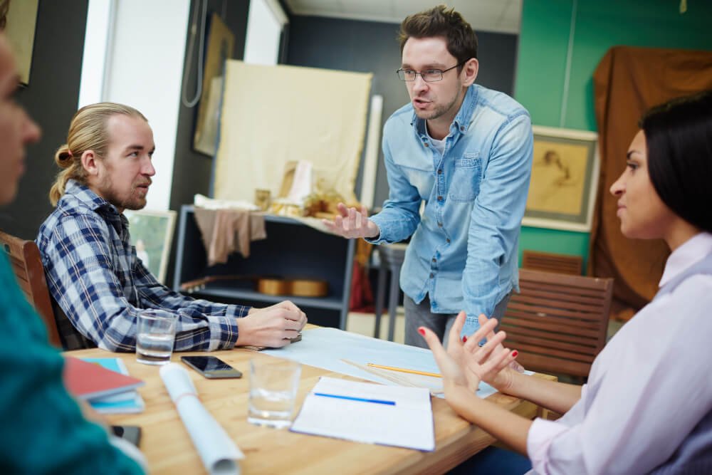 Professionals collaborating on payroll and workforce planning
